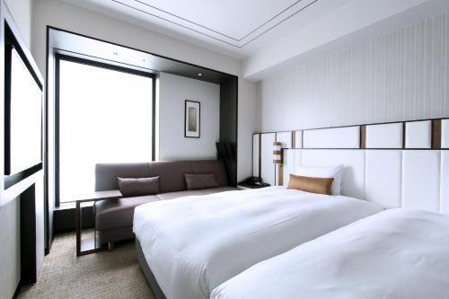 KOKO HOTEL Premier Nihonbashi Hamacho - Tap to explore photos