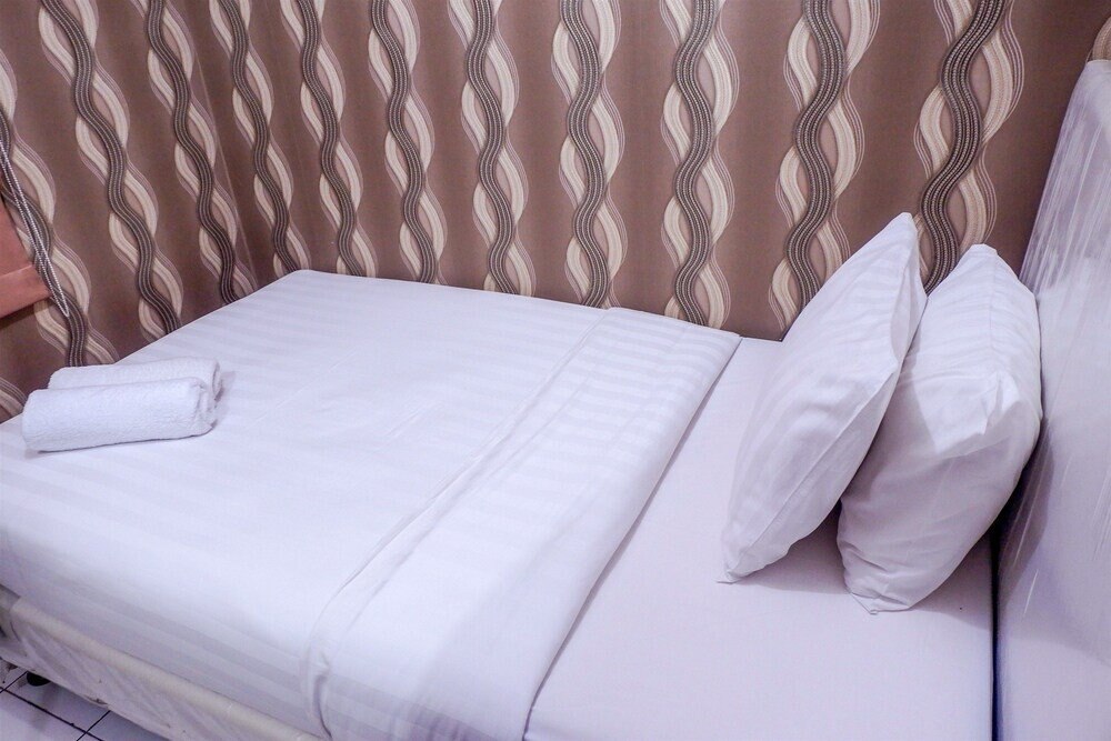 Warm Cozy Menteng Square Apartment - Tap to explore photos