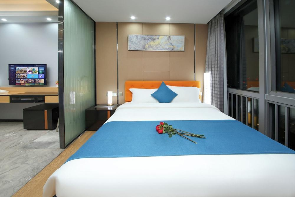 Pengman International Apartment Hotel - Tap to explore photos