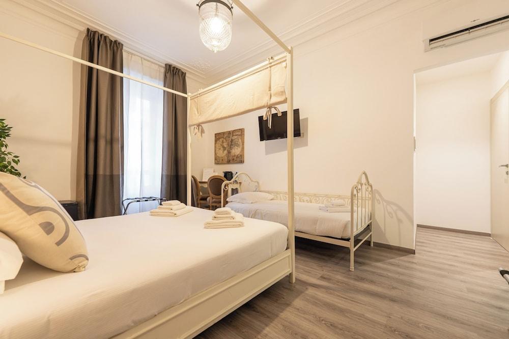 Flaminia Rooms&Suites - Tap to explore photos