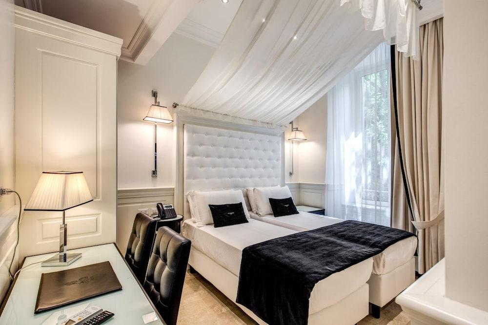 Hotel dei Quiriti Suite Room Type - Twin Room