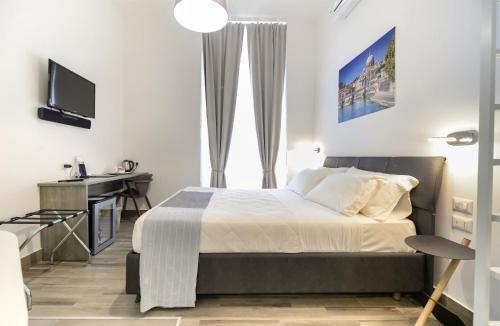 Clementi 18 Suites Rome - Tap to explore photos
