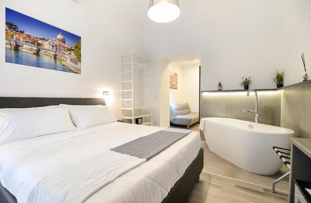 Clementi 18 Suites Rome - Tap to explore photos