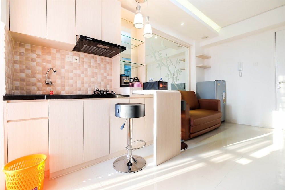 2 Bedrooms at Bassura City Apartment with Mall Access By Travelio - Tap to explore photos