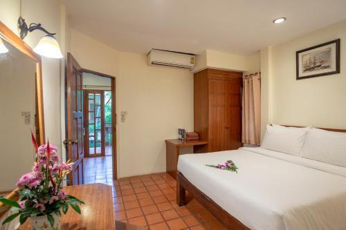 Bangtao Village Resort - Tap to explore photos