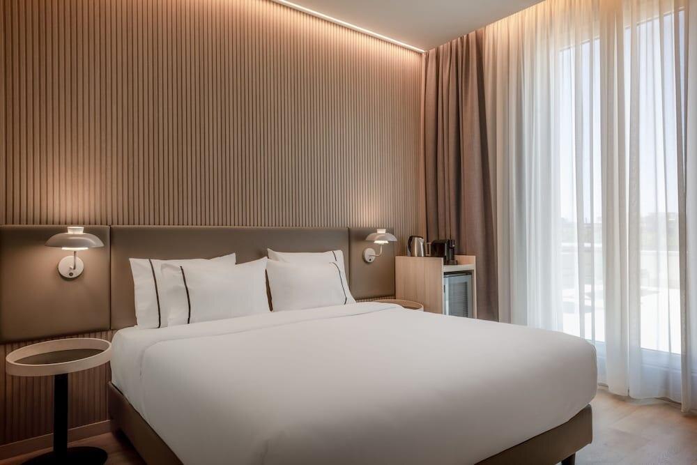 AC Hotel by Marriott Clodio Roma - Tap to explore photos
