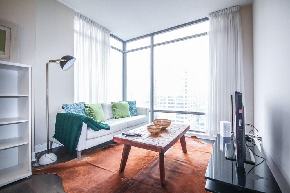 Sarkar Suites - YorkVille - Tap to explore photos