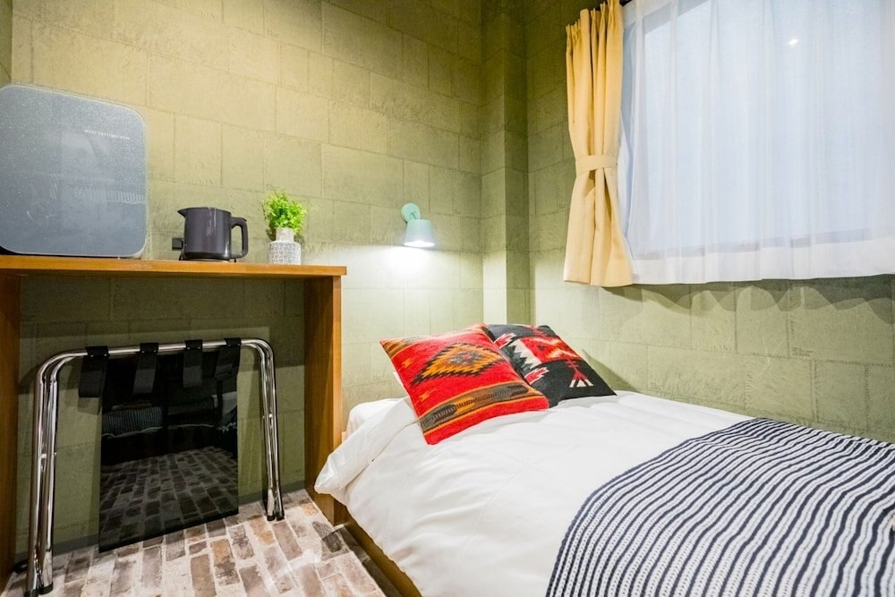 IKIDANE Residential Hotel Komagome - Tap to explore photos