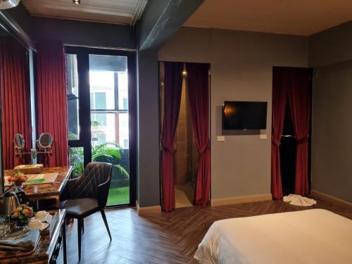 Ratchada Boutique Hotel - Tap to explore photos