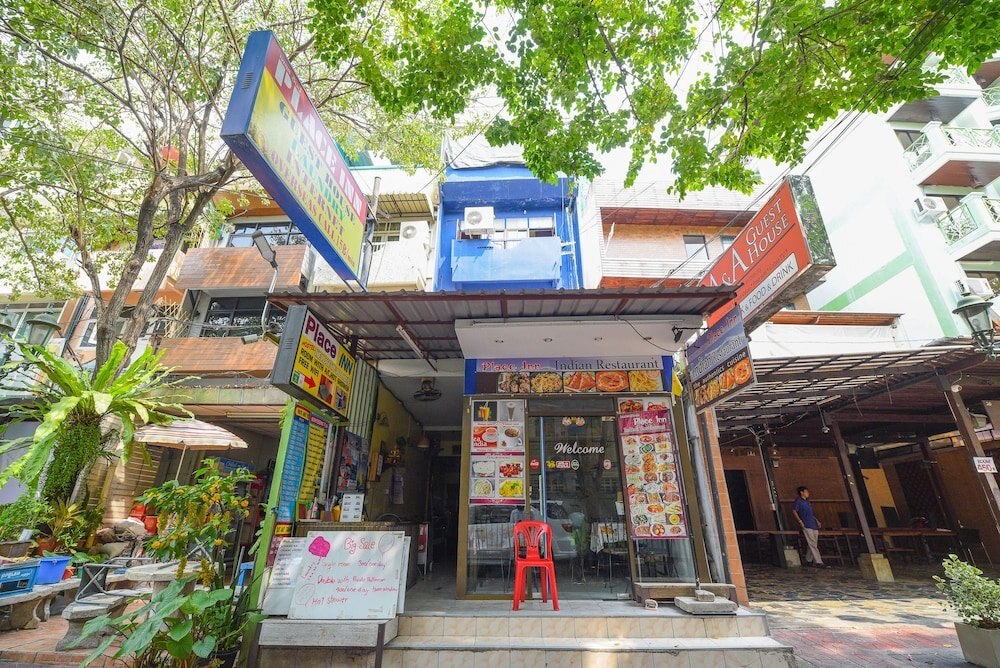 OYO 938 Place Inn - Hostel - Tap to explore photos
