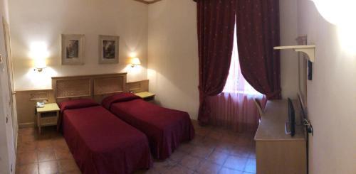 Hotel Quadrifoglio by Mancini - Tap to explore photos