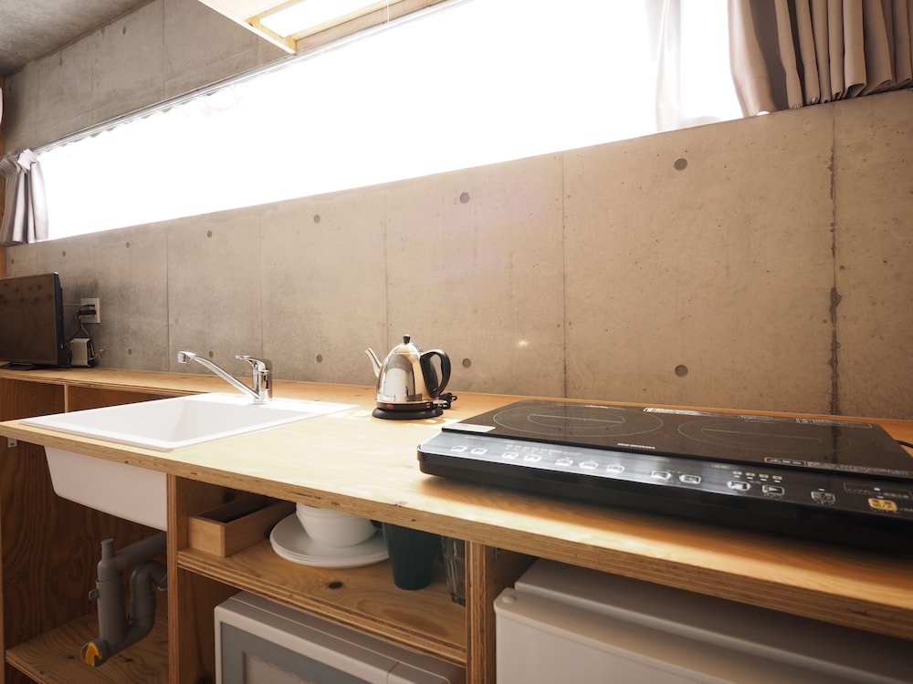 Smi:re Stay Oshiage - Tap to explore photos