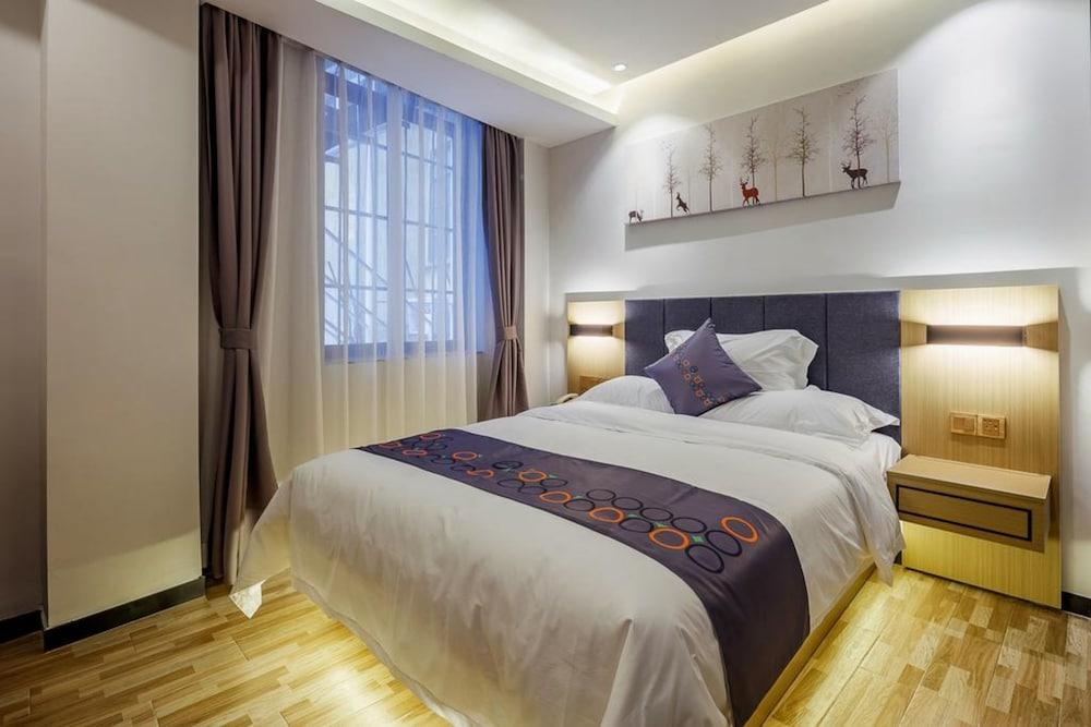 Yimi Apartment Pazhou Exhibition Branch - Tap to explore photos