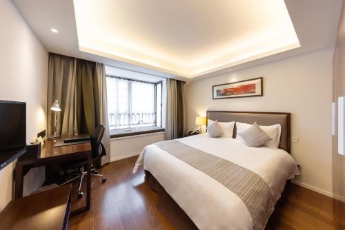Starr Hotel and Serviced Apartment ,Jing An - Tap to explore photos