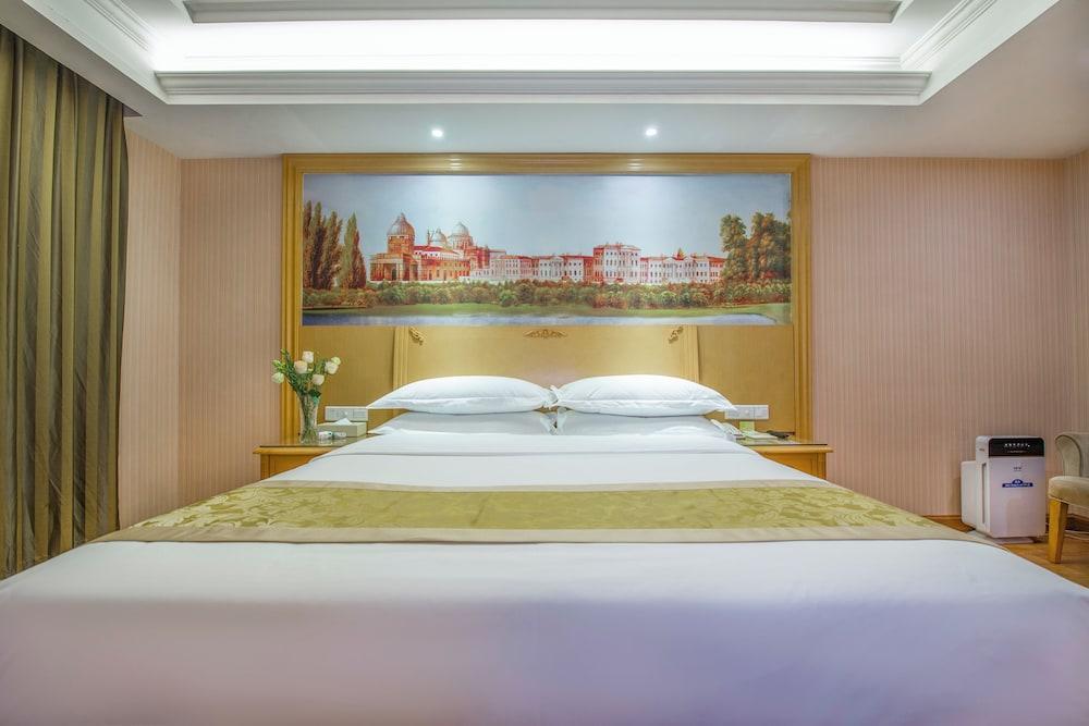 XINHAOMEI INTERNATIONAL HOTEL - Tap to explore photos