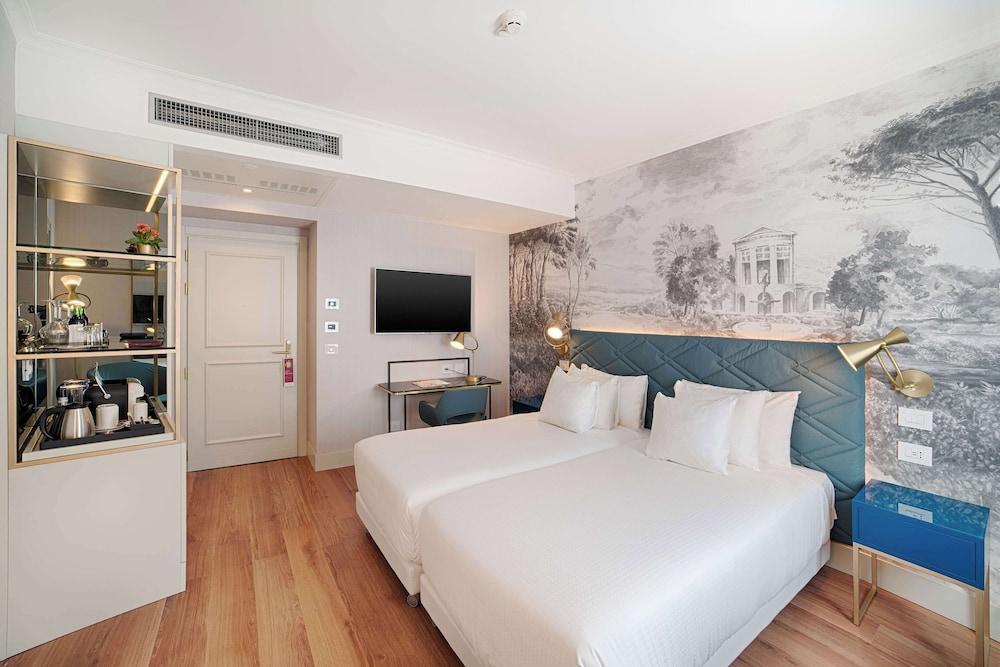 NH Collection Roma Fori Imperiali Hotel - Tap to explore photos