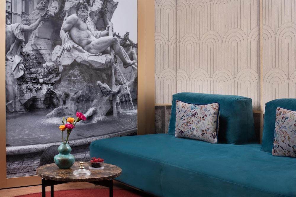 NH Collection Roma Fori Imperiali Hotel - Tap to explore photos
