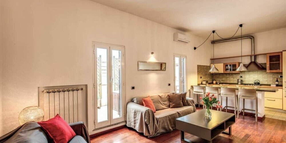 Attic terrace with St Peter's Dome View - Tap to explore photos