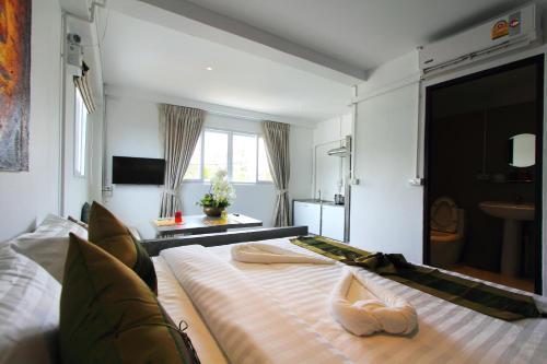 Samui Beach Residence Hotel - Tap to explore photos