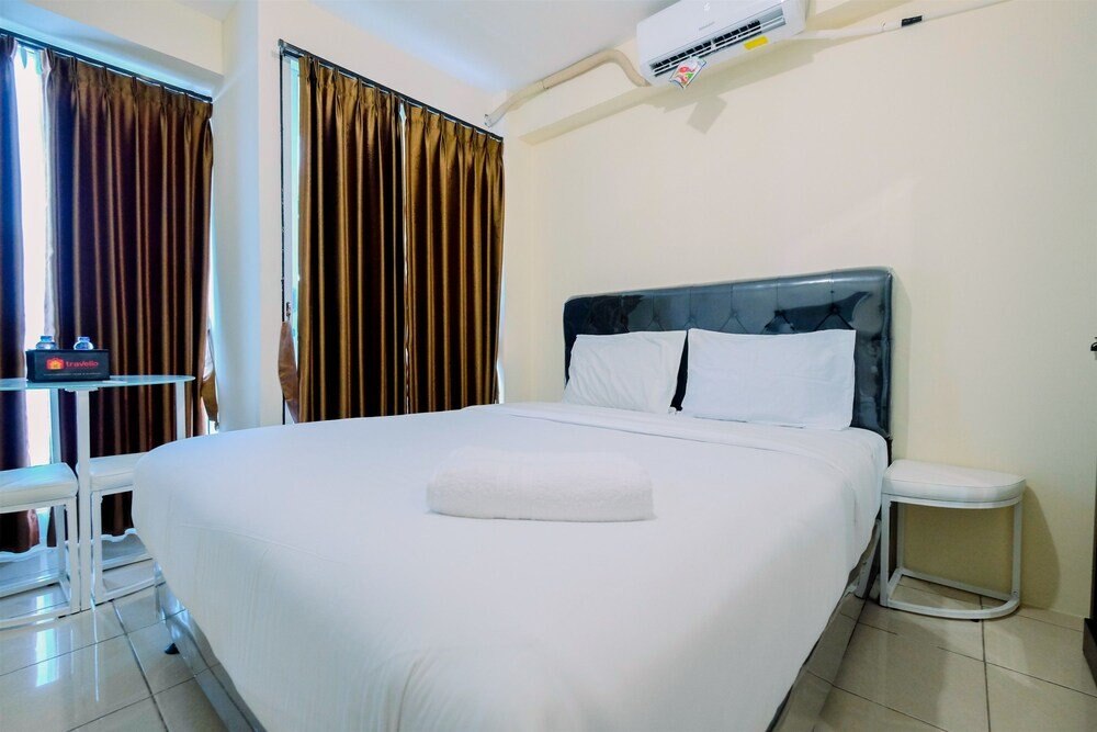 Comfy Studio Room at Tifolia Apartment - Tap to explore photos