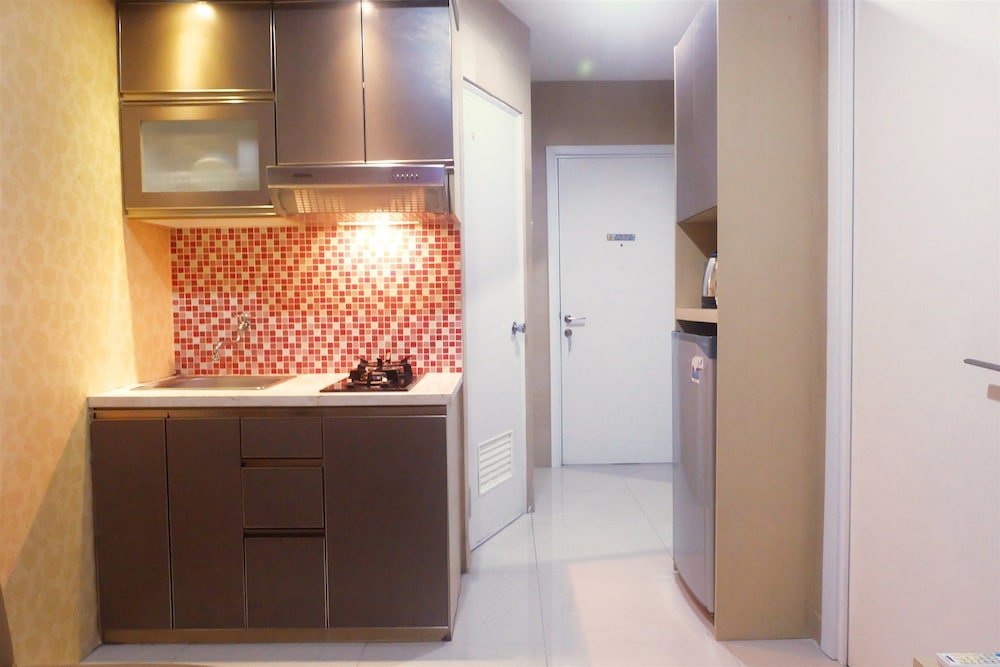 Best Price Green Pramuka Apartment - Tap to explore photos