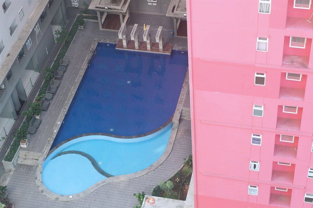 Best Price Green Pramuka Apartment - Tap to explore photos