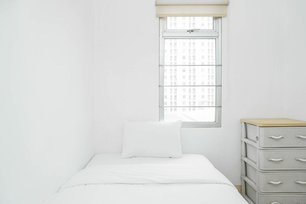 Spacious 2BR Green Bay Pluit Apartment - Tap to explore photos