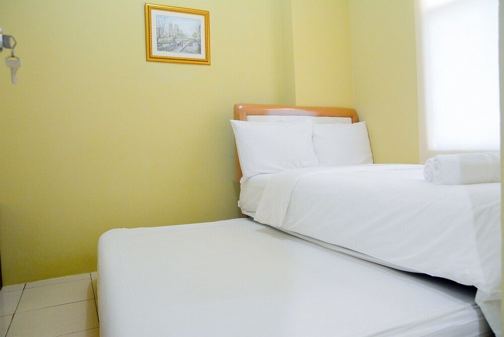 Comfy 2BR Green Bay Pluit Apartment - Tap to explore photos