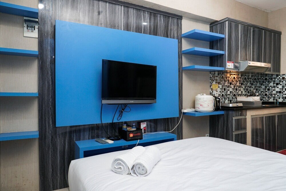 Blue Studio Apartment at Green Bay Pluit - Tap to explore photos