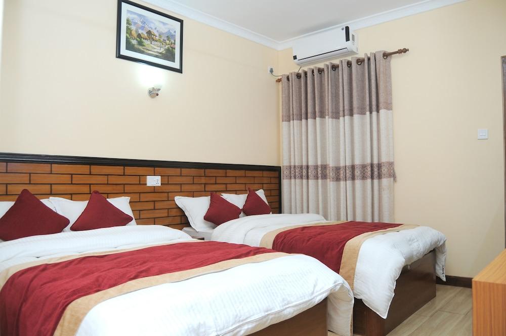 Hotel Bagmati Pvt. Ltd. Room Type - Deluxe Quadruple Room, City View