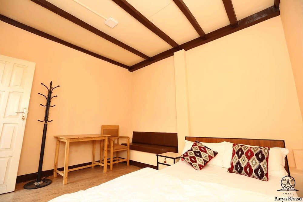 Aarya Chaitya Inn Room Type - Economy Double Room, 1 Double Bed, Shared Bathroom, Garden View