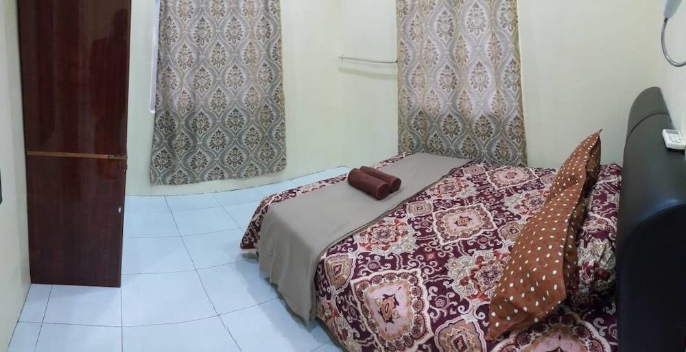 Chily Guesthouse - Tap to explore photos
