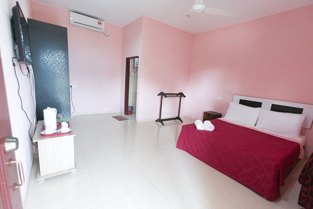 Sri Melor Inn - Tap to explore photos
