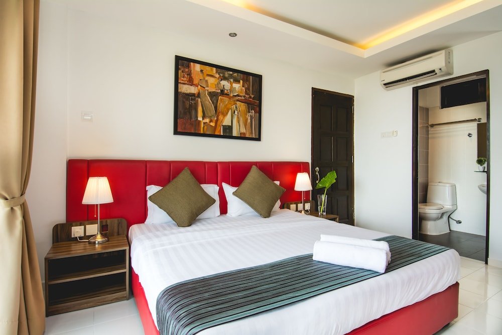 Alia Residence Room Type - Deluxe King Partial Seaview