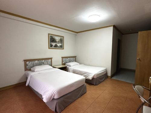 Garden Paradise Hotel & Serviced Apartment - Tap to explore photos