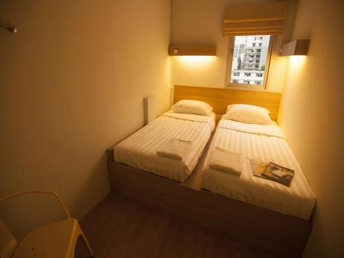Micro Hostel Room Type - Standard Twin Room with Shared Bathroom