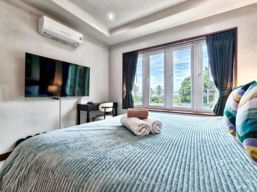 Surisa Seaview Pool Villas - Tap to explore photos