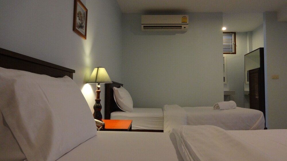Mango Bedroom Inn - Tap to explore photos