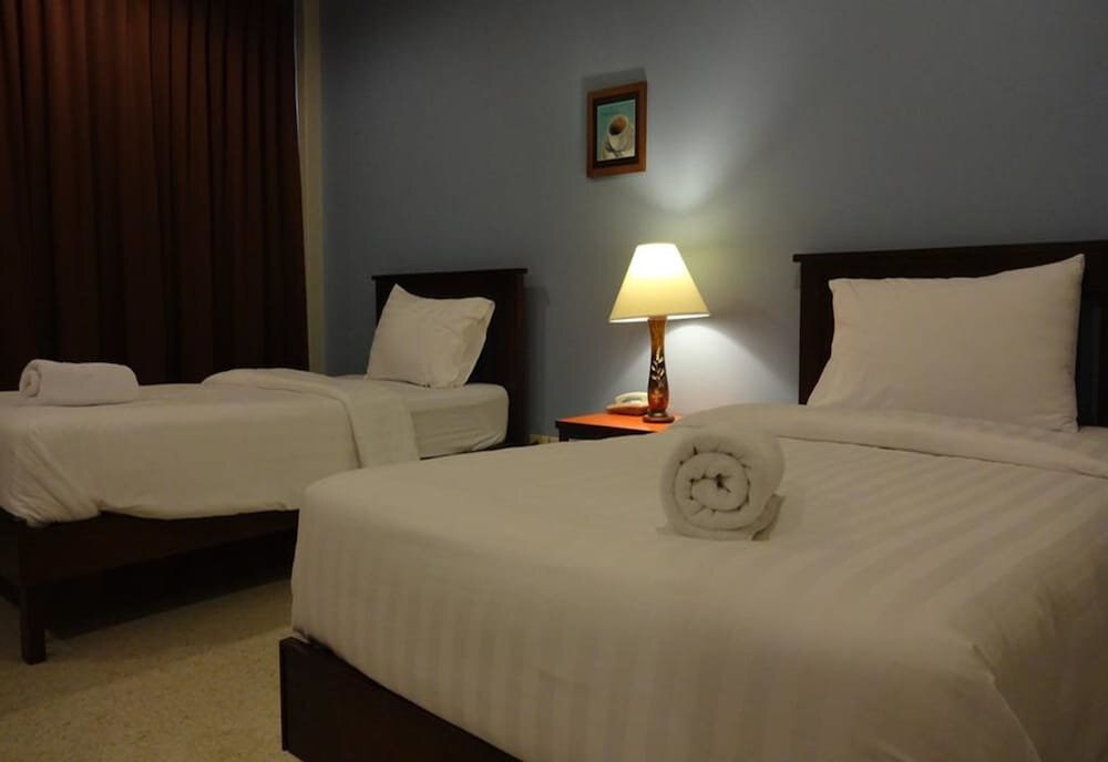 Mango Bedroom Inn Room Type - Deluxe Twin Room