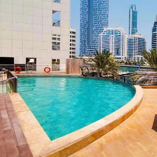 Signature Hotel Apartments & Spa - Tap to explore photos