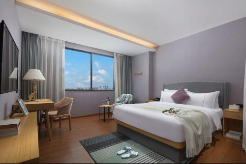 Guangzhou Mustin Hotel - Tap to explore photos