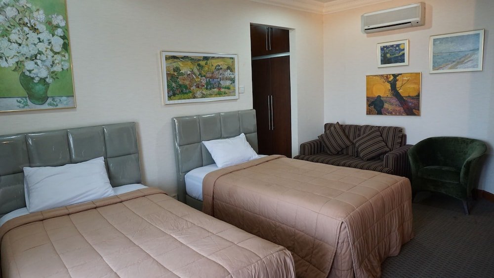 Toeti Roosseno Plaza Room Type - Deluxe Double or Twin Room