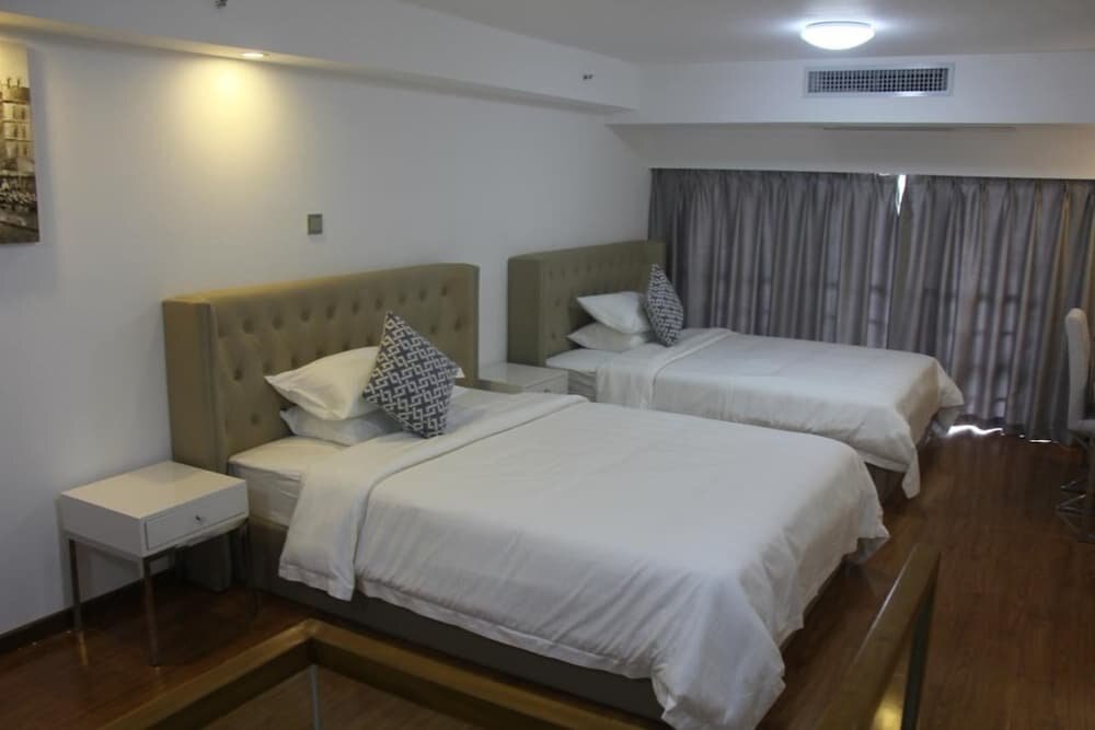 YUMI Apartment-Shiqiao Station Branch - Tap to explore photos