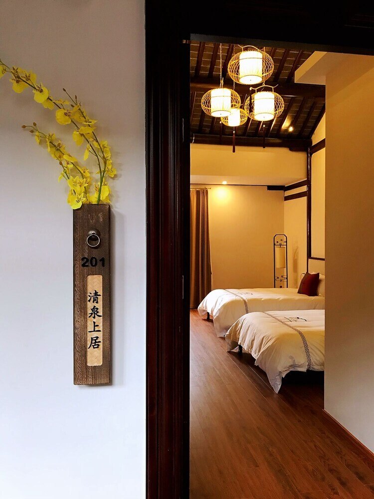 Yi Garden Cultural Hotel Disney Branch - Tap to explore photos
