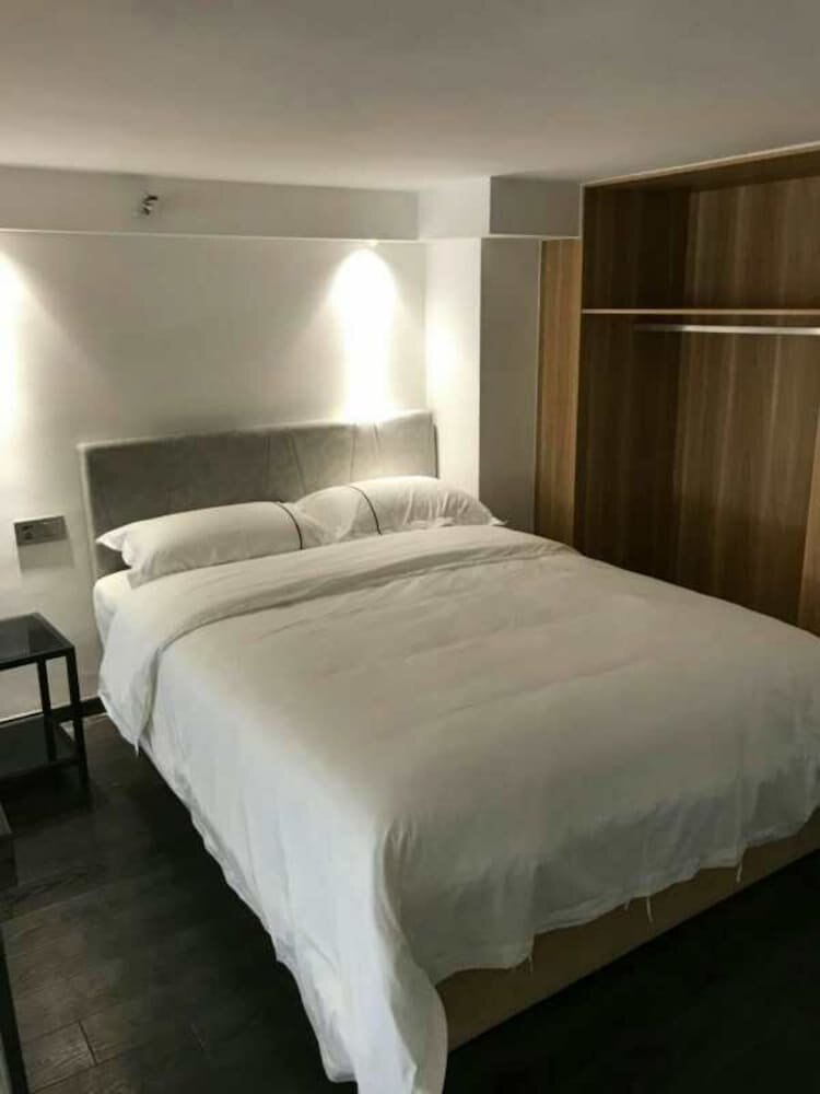 Xitishu Hotel Apartment - Tap to explore photos
