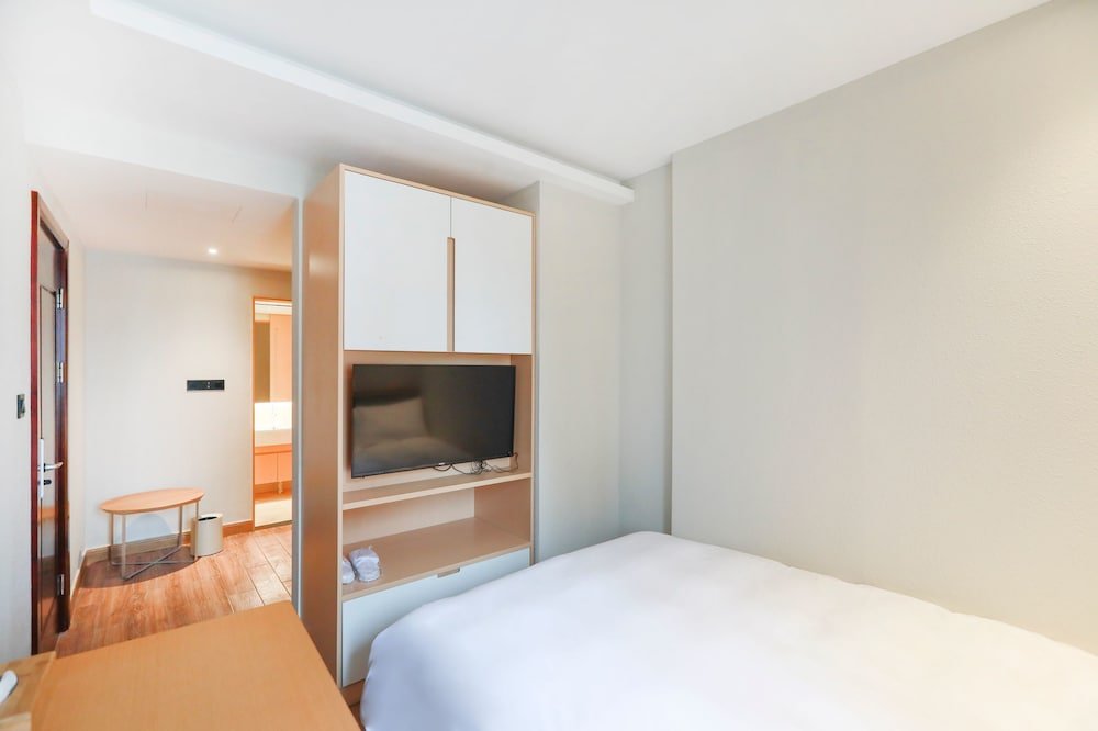 CJIA Service Apartment Hotel - Tap to explore photos