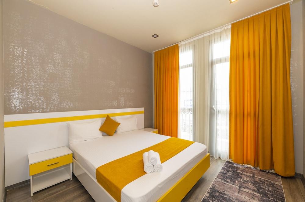 Agora Suites - Tap to explore photos
