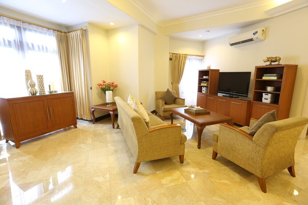 Aditya Mansions Apartment - Tap to explore photos