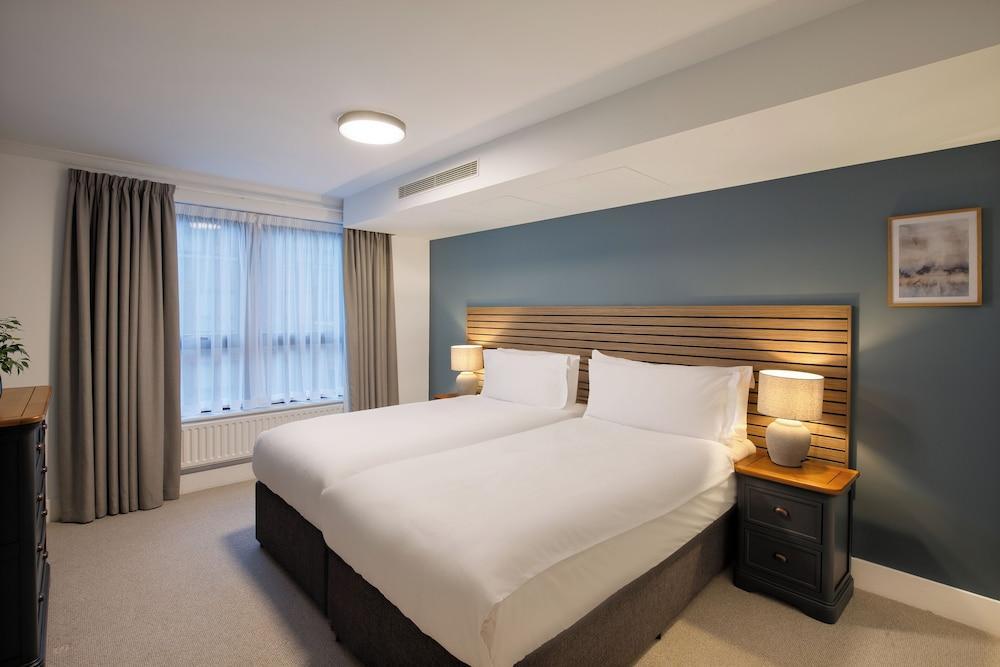Monarch House Serviced Apartments - Tap to explore photos