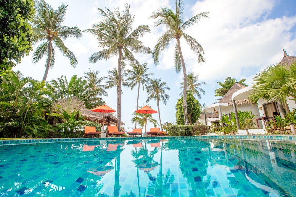 Secret Garden Beach Resort - Tap to explore photos